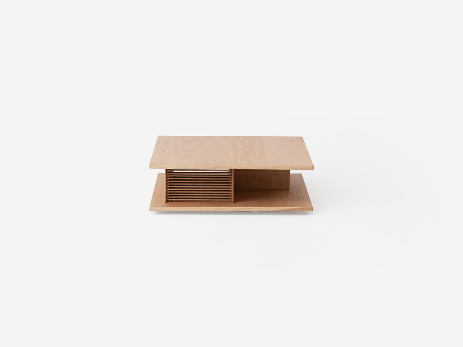 Front left view of the Plank modern square coffee table in oak with slats